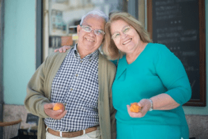 elderly couple smiling