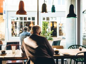 Man in chair with table