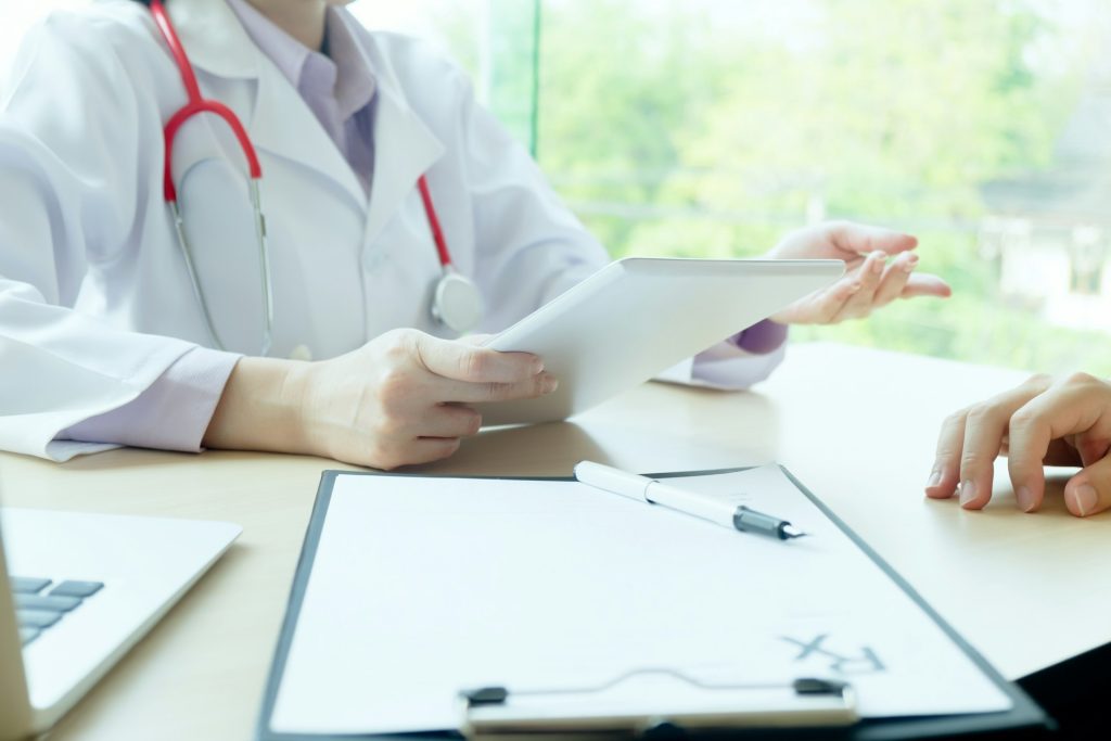 A doctor checking patient