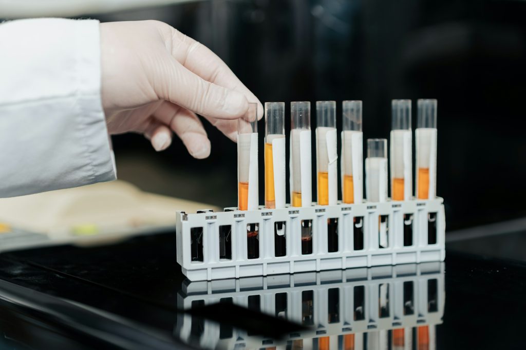 A person holding a test tube