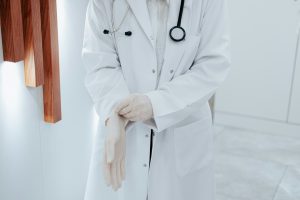 A doctor wearing a white coat