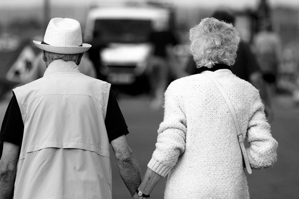 A man and a woman walking