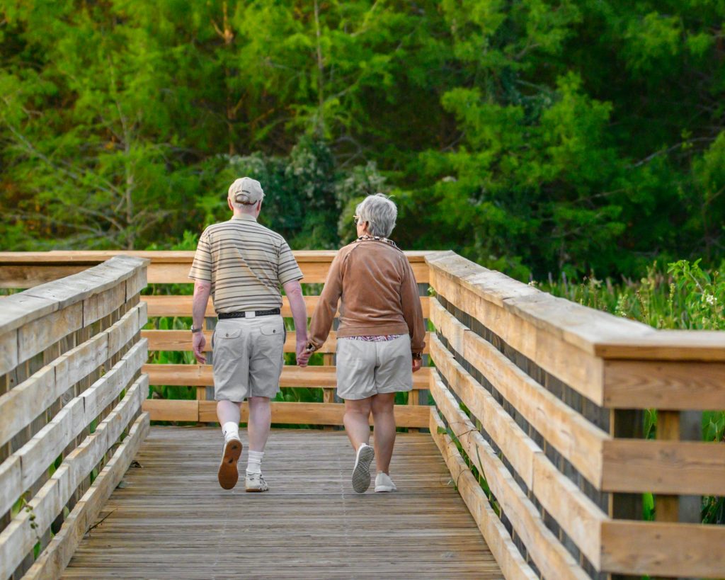 Two senior walking