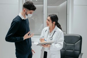 A doctor talking to a patient