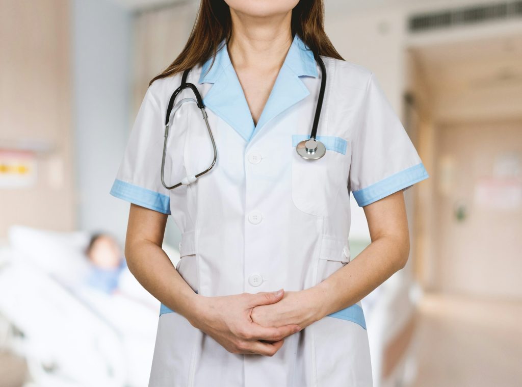 A woman in white button up shirt