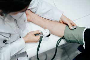 A doctor checking a blood pressure