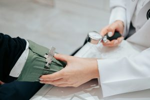 A person is holding a blood checker