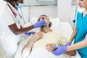 A female doctor holding a patient