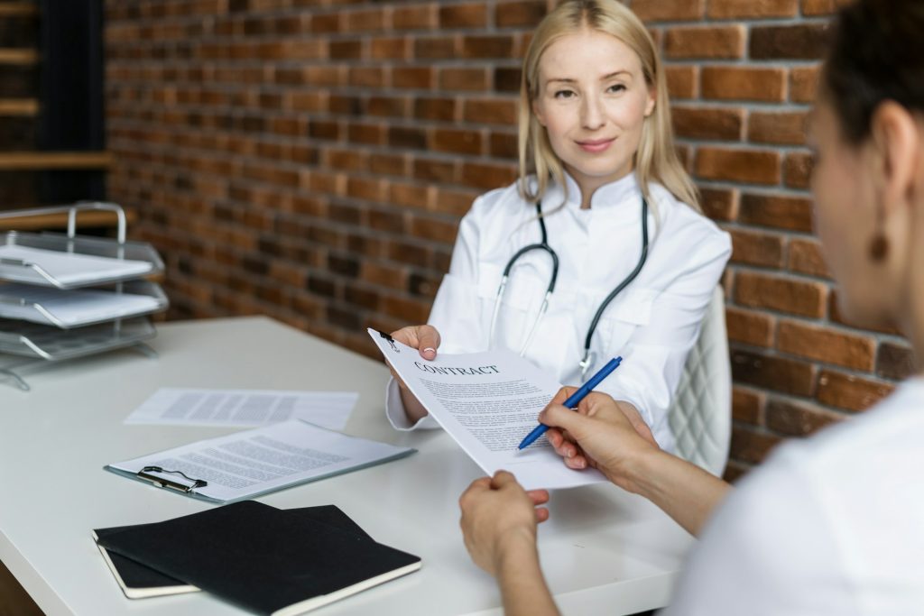 A doctor talking to another person