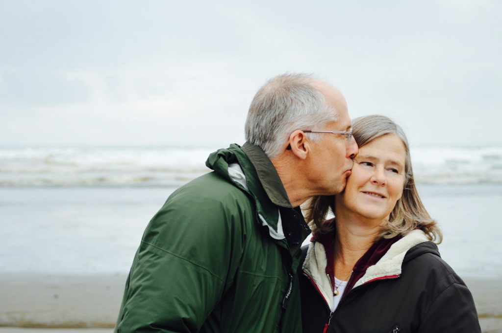 An old couple by the beach